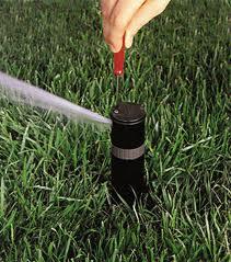 a Santa Rosa sprinkler optimization tech is doing a seasonal adjustement